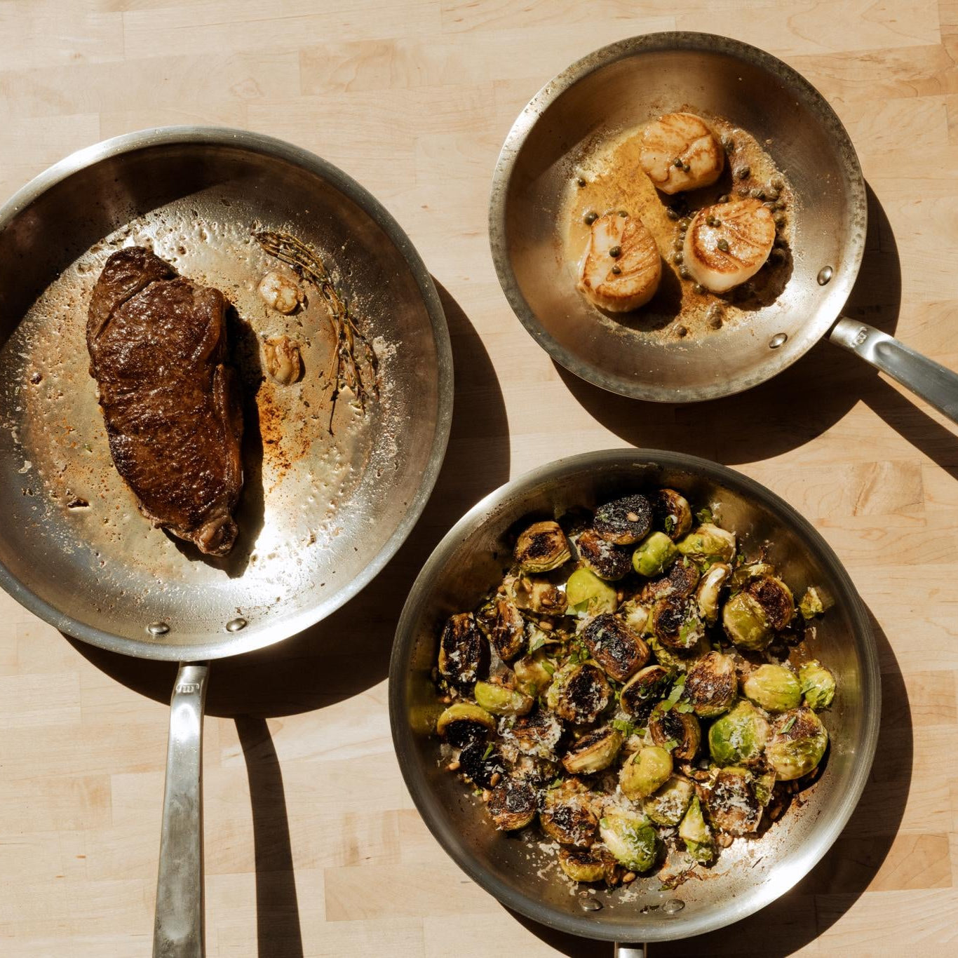 3 dif sized frying pans